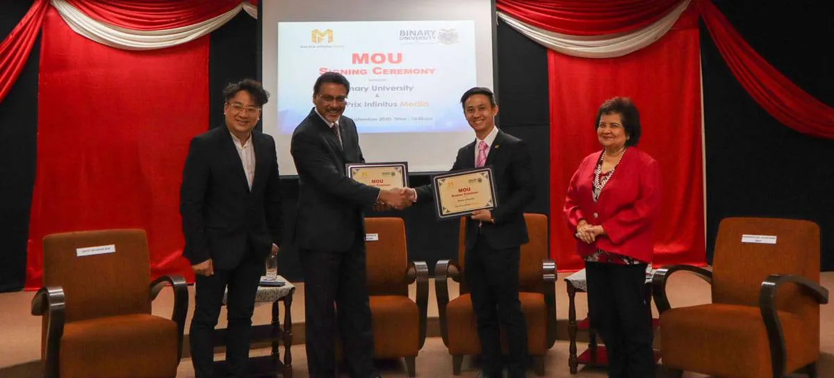 An engaging depiction of the MoU signing ceremony with leaders from Binary University and DPI Media, featured in the article on Binary University inks MoU with DPI Media for up-and-coming entrepreneurs