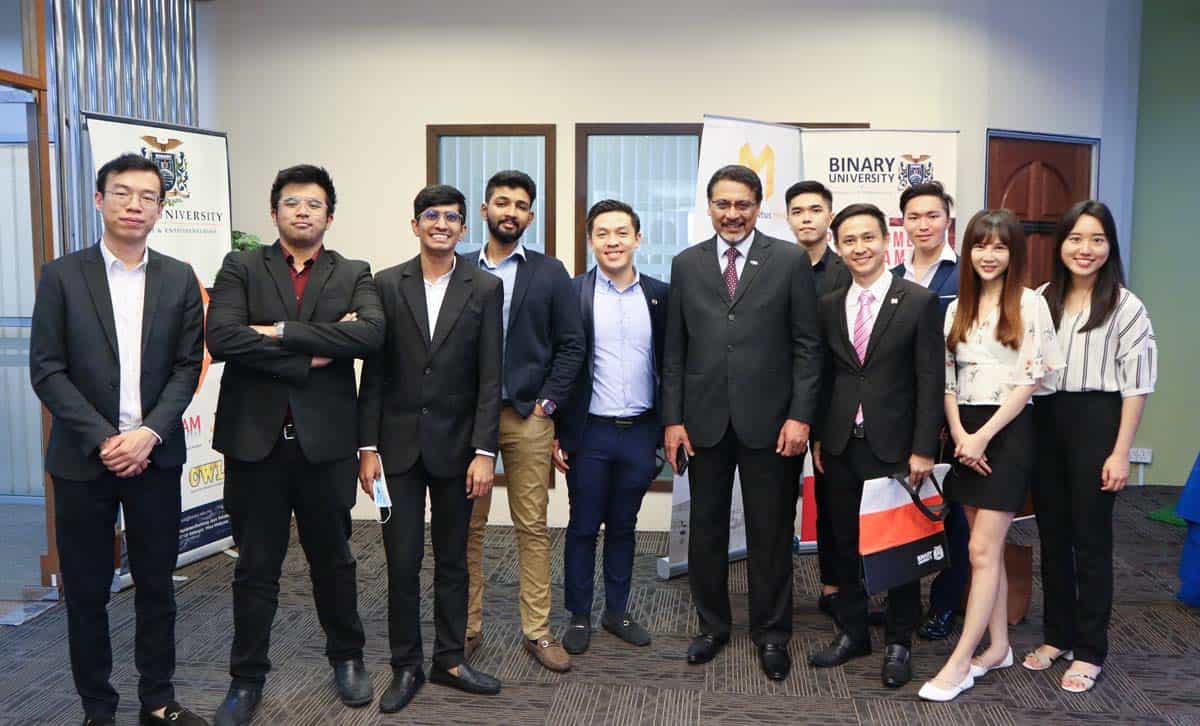 Tan Sri Dato' Professor Joseph Adaikalam and Mr. Hagenz Choo with the Des Prix Infinitus Media's Sales & Marketing Management team at Binary University