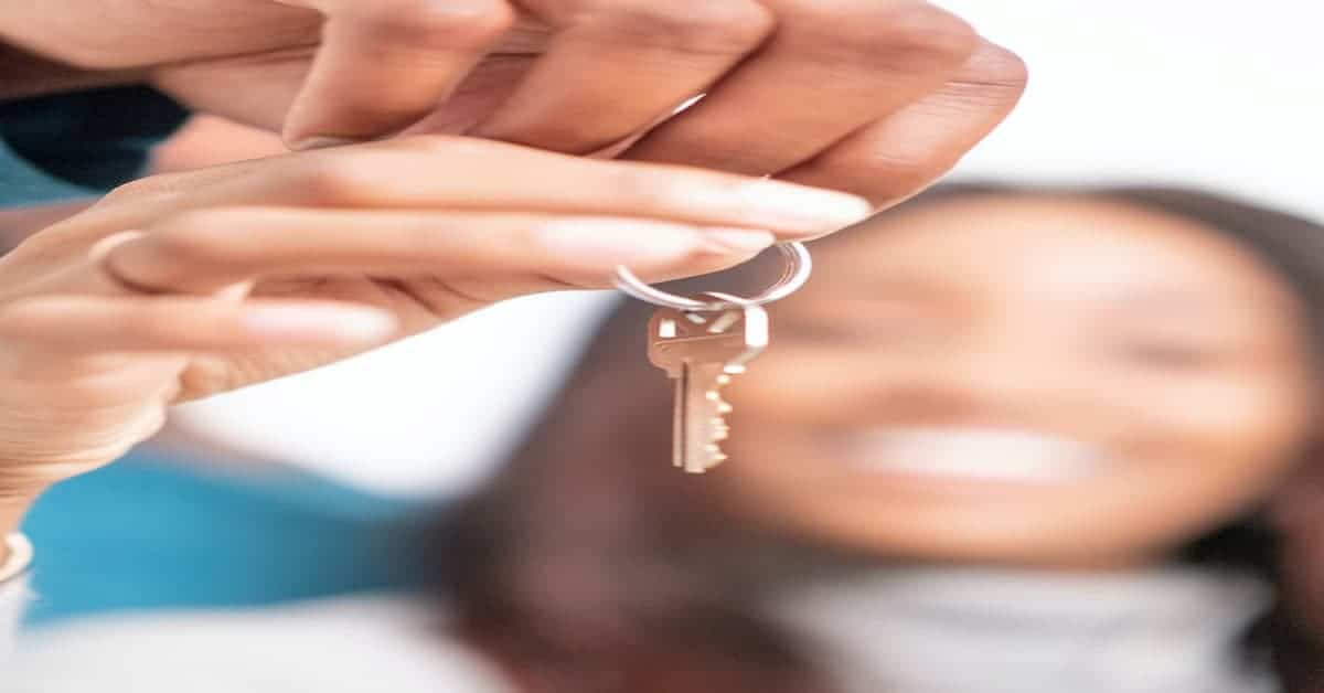 Person Holding a house Key