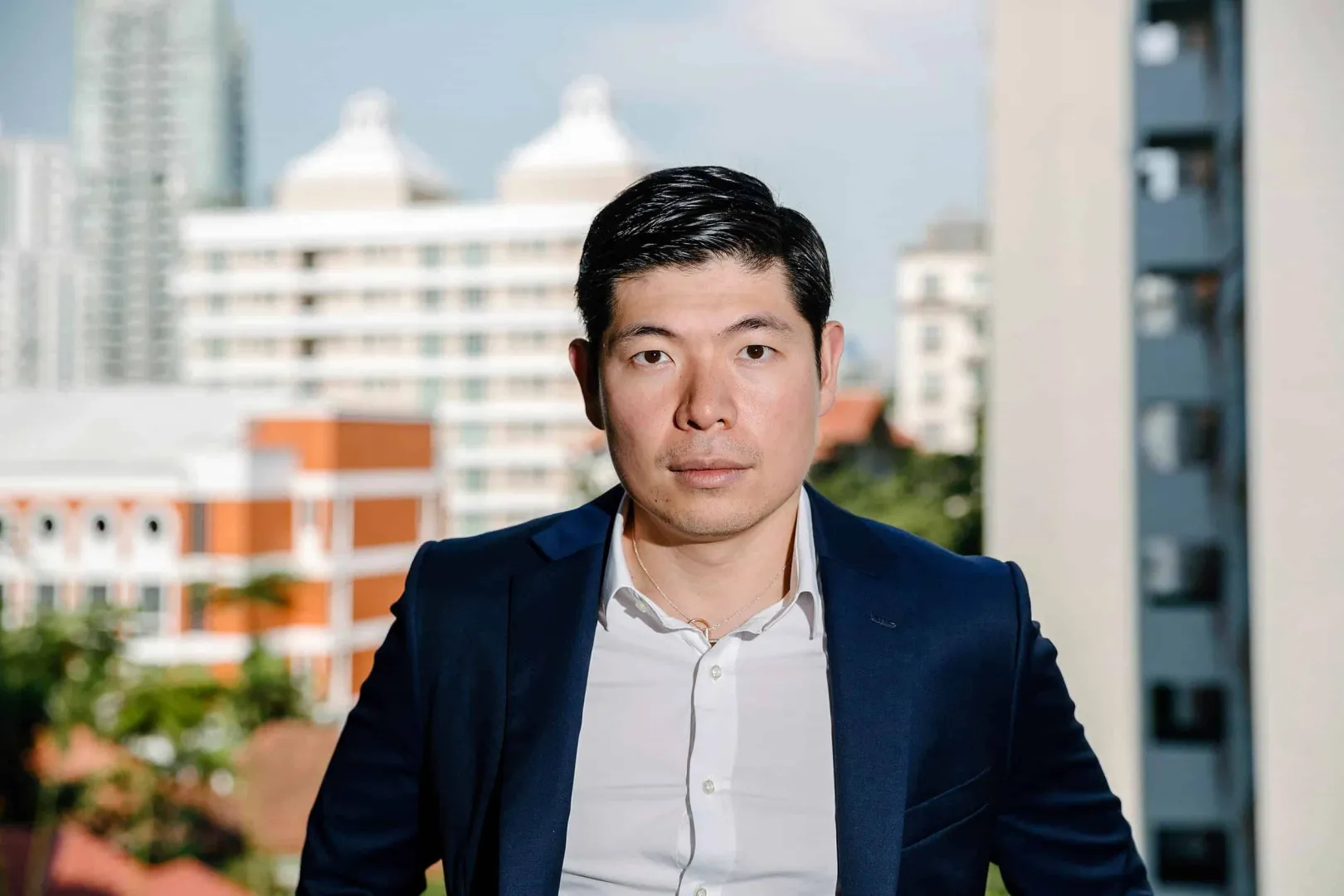 A shot of Grab founder Anthony Tan with the city in the background
