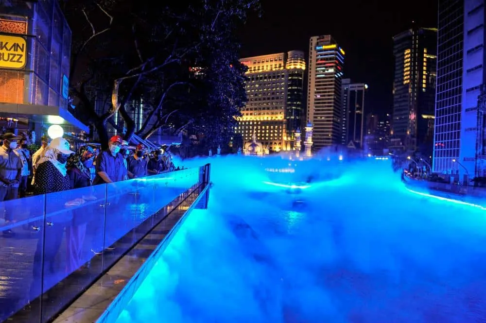 The river of night during one its performances with people enjoying it.