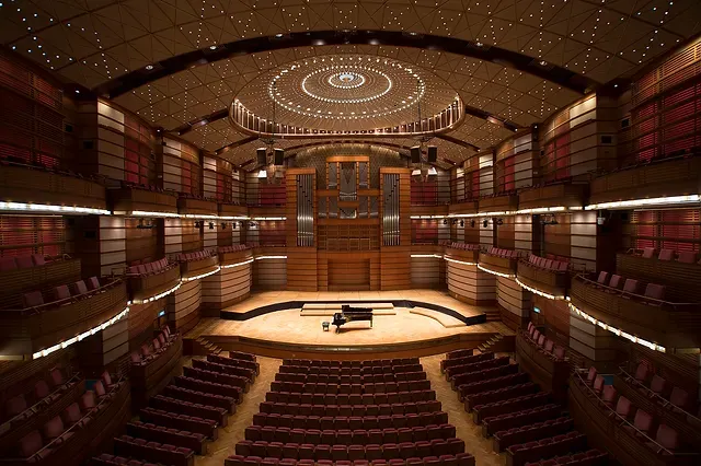 The hall of Dewan Filharmonik Petronas's with a piano in the middle of the stage