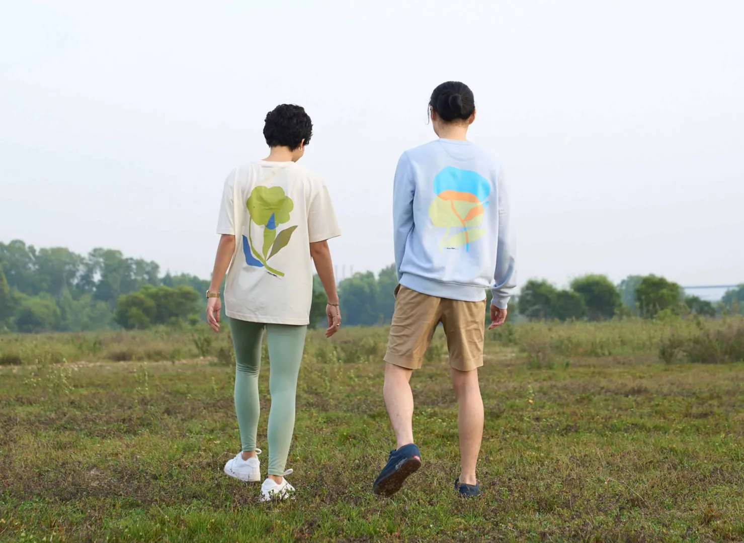 A photoshoot of two models wearing Terrae