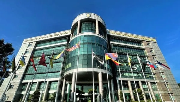 The entrance to Universiti Teknologi MARA with the flags of Malaysia