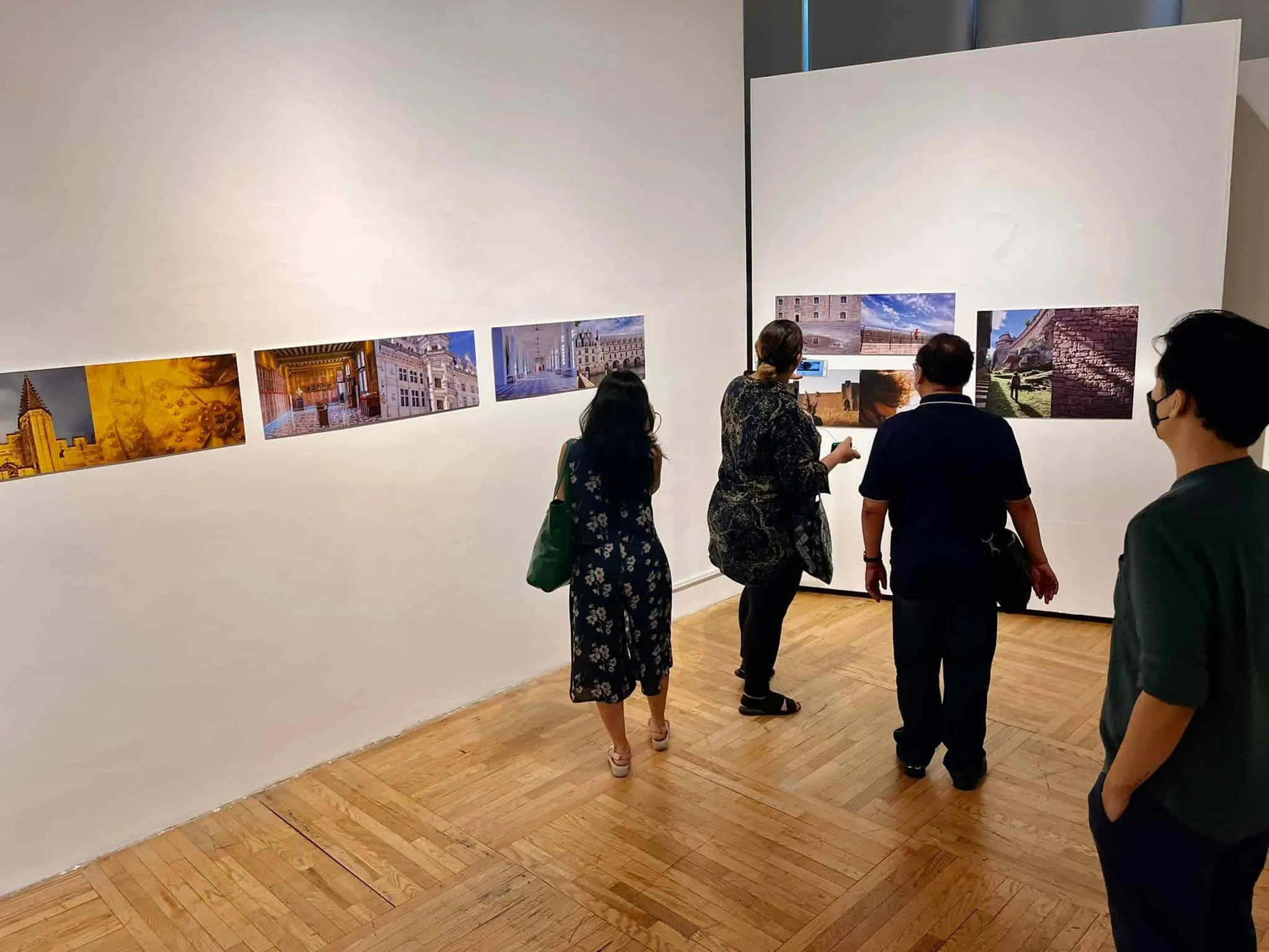 People walking around the MAP @ publika appreciating the pieces