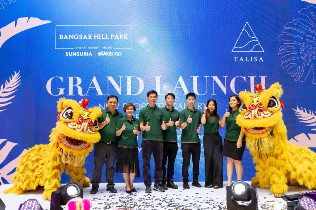 Bangsar Hill Park's management team cutting the ribbon at the grand opening ceremony, signifying the inauguration of premier urban living.