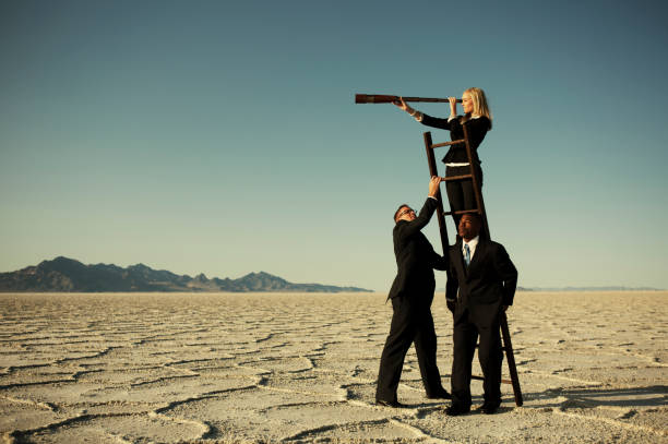A Young Businesswoman Looks To The Future For Her Business Team.
