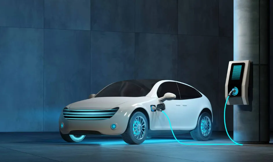 Modern electric car charging at an EV station.